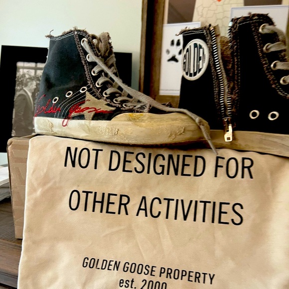 Golden Goose. Only worn a few times!! Like new. Comes with the box and bag!